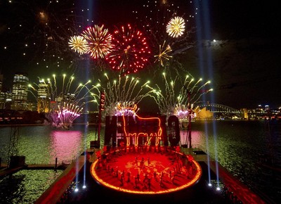 Sydney skyline lit up by 'Carmen'. Opening night of Handa Opera on Sydney Harbour. Photo: James Morgan/Opera Australia